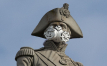 Air pollution activists cover landmark London statues with masks