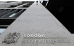 London's FTSE 100 hits record high on weak pound