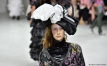 Designers send models down Paris runway in garbage bags