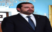 Hariri says resignation on hold, pledges to stay in Lebanon