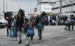 EU urges faster Greece vetting of migrants as arrivals soar